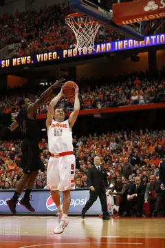 Syracuse guard Trevor Cooney goes up for a layup in the first half.