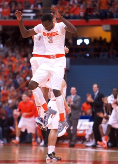 Syracuse's Jerami Grant (3) celebrates a put-back slam with point guard Michael Carter-Williams. Grant finished the game with a career-high 13 points on 4 of 7 shooting.