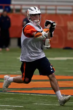 Syracuse attack Pat Powderly prepares to fire a pass.