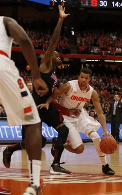 Michael Carter-Williams drives left into the paint in the Orange's 58-53 loss to No. 10 Louisville Saturday afternoon.