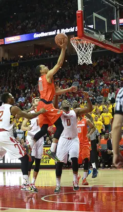 Tyler Ennis glides in for a layup, leaving a pack of Maryland defenders in his dust. 