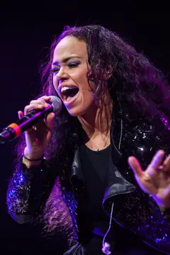 Elle Varner sings during the opening act in the Carrier Dome on March 21, 2014.