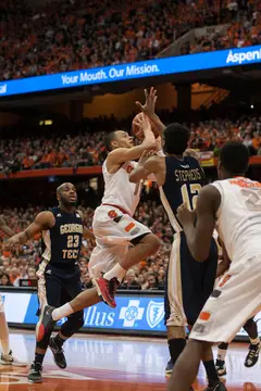 Tyler Ennis tries to score in the lane. Ennis finished with 18 points, but he shot just 2-of-5 from the line.