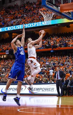 Cooney drives into the paint for a layup against Blue Devils backup center Marshall Plumlee.