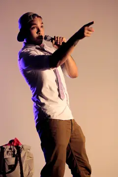 Jordan Bowens performs at Delta Kappa Alpha's comedy night, which was held at Gifford Auditorium in Huntington Beard Crouse.