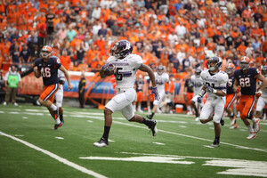 Northwestern running back Venric Mark returns a punt return 82 yards for a touchdown in the first half against Syracuse on Saturday.