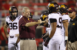 Matt Limegrover, Minnesota's offensive coordinator, has been coaching with head coach Jerry Kill for 14 years. Through three games this season, the duo has helped Minnesota put up 34 points per game.
