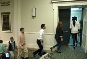 As part of an election protocol, candidates leave Maxwell Auditorium while their qualifications are discussed.