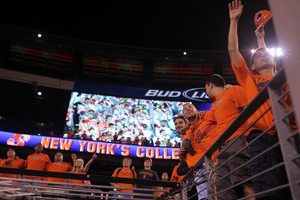 Syracuse fans at MetLife Stadium sing the alma mater following SU's 42-29 loss to USC Saturday.