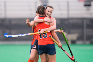 Syracuse players celebrate during the Orange's 5-0 win over Yale on Sunday. Syracuse has shut out four straight opponents, and hasn't allowed a goal since Sept. 16. 