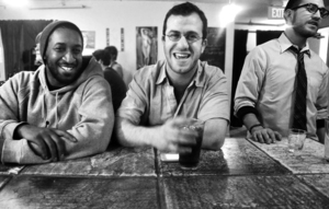 (From left) Emannuel Washington, Adam Gold and Jack Brown, members of Sophistafunk, share beverages and laugter. They recently put an album out on vinyl.