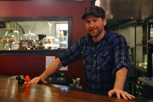 Brandon Roe is co-owner of Beer Belly Deli, one of three new restuarants to open on Westcott Street. Developers, business owners and residents of the Westcott neighborhood hope the new eateries will spark more interest and a stronger sense of community in the area.
