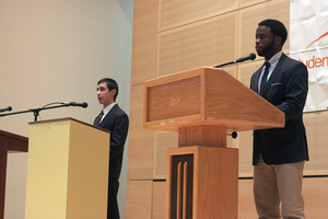 Student Association comptroller candidates Stephen DeSalvo and Osarumwense Pat-Osagie appear on stage for the SA debate at the Joyce Hergenhan Auditorium in Newhouse III.