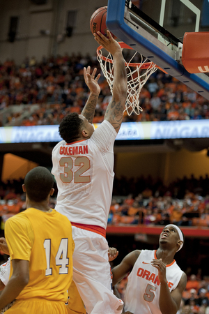 Syracuse center DaJuan Coleman and the rest of the Orange's big men are looking to improve their production inside the pain with Big East schedule starting in the coming days. SU plays its final nonconference game against Central Connecticut on Monday at 3 p.m. in the Carrier Dome. 