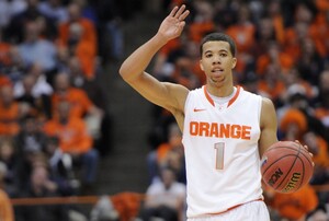 Michael Carter-Williams directs the Syracuse offense. The guard took on more of a leadership role when senior guard Brandon Triche fouled out with 1:29 remaining and knocked down 5-of-6 free throws down the stretch.
