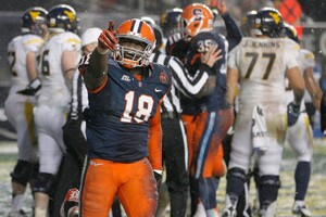 Syracuse linebacker Siriki Diabate points to the crowd in the Orange's 38-14 win over West Virginia in the Pinstripe Bowl on Saturday. Diabate finished with five tackles in his hometown Bronx. 