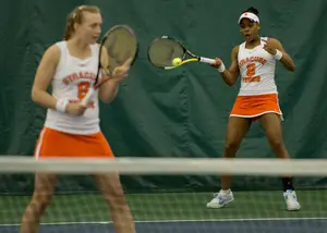 Aleah Marrow returns a ball in a doubles match with Maddie Kobelt. The duo gave Syracuse a win in its third and final doubles match on Saturday.
