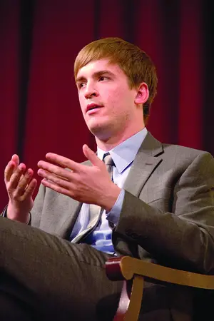 Stephen Barton, a 2012 Syracuse University alumnus who is an outreach assistant for Mayors Against Illegal Guns in New York City and a victim of the July 2012 movie theater shooting in Aurora, Colo., gave the keynote speech during the discussion on gun control at SU on Tuesday night.