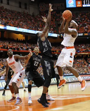 C.J. Fair attempts a shot in Syracuse's 57-46 loss to Georgetown on Saturday in the Carrier Dome. Fair finished with 13 points.