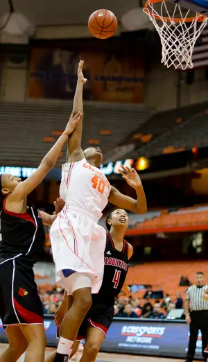 Syracuse center Kayla Alexander attempts a layup in her Senior Night victory over No. 13 Louisville. Alexander scored 16 points in her final game in the Carrier Dome.