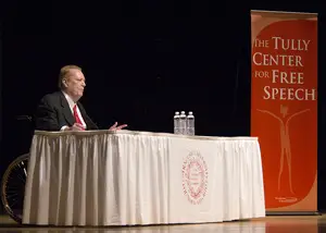 Larry Flynt, Hustler magazine publisher and a free speech advocate, speaks at Goldstein Auditorium on Tuesday night. Flynt was paralyzed from the waist down after a man got angry at him for publishing an interracial photo in Hustler and attempted to assassinate him.