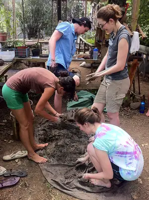 (From top left) Dan Gilroy, Cherissa Dukelow, Lauren Alteio and Jules Davey, SUNY-ESF students and a Mastatal Ranch employee, experiment with sustainable materials in Costa Rica.