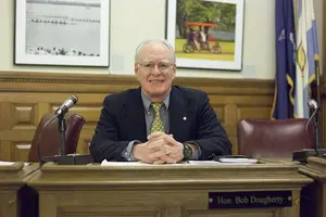 Syracuse Common Councilor Bob Dougherty sits at his desk at city hall. Dougherty says Syracuse's initiative to end gang-related violence lets gang members know that they can 
