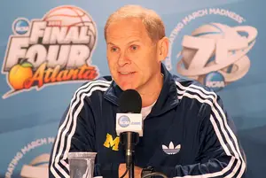 John Beilein earned head coaching jobs at Canisius and West Virginia partially due to the recommendation of Jim Boeheim before taking the helm at Michigan. Beilein used to coach nearby Division-II Le Moyne College from 1983-92.