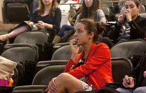 Allie Curtis, SA president, sits in the front row of Maxwell auditorium during Monday night's meeting. Curtis was stripped of her ability to preside over meetings for the rest of the semester during a special assembly meeting on Sunday.