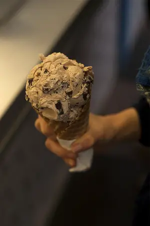 Gannon's Isle makes delicious homemade ice cream daily, like this Almond Bark single-scoop in a waffle cone.