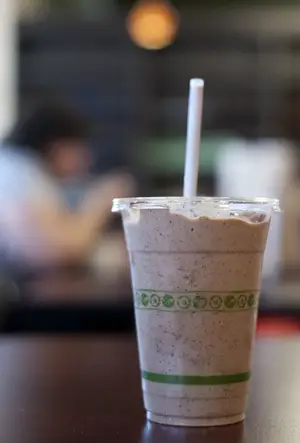 The mocha Nirvana smoothie at the Tyme-Out Café, part of the Natur-Tyme grocery store, offers an enjoyable consistency, although the ground espresso was unappealing.