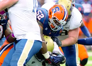 Eric Crume has a chance to excel for Syracuse at defensive tackle despite having short limbs. Working alongside Jay Bromley and with defensive line coach Tim Daoust has helped improve his game. 