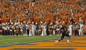 Christopher Clark glides into the end zone for his first of two touchdowns, this one a 41-yard pass from Terrel Hunt, during Syracuse's 54-0 blowout win over Wagner on Saturday.