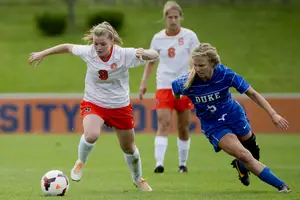 Jackie Firenze charges ahead with the ball. The Syracuse midfielder scored the game-tying goal from the ground against No. 18 Duke.