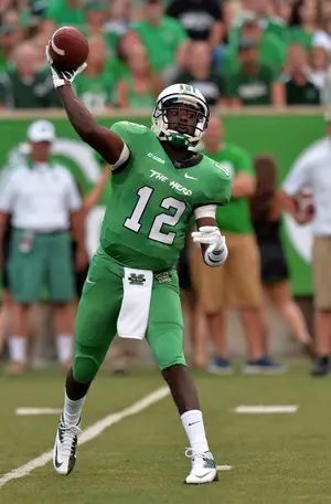 Rakeem Cato and Tommy Shuler have been best friends since the age of 5. Now juniors at Marshall, Cato is the starting quarterback and Shuler is his top target.
