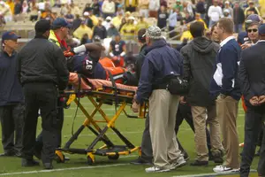 Syracuse defensive tackle John Raymon gets carted off the field after suffering an injury against Georgia Tech. SU Athletics announced that he will have season-ending surgery.