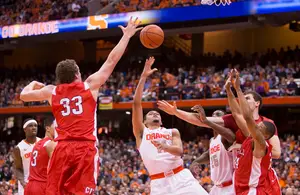 Syracuse guard Tyler Ennis dished out seven assists in the season-opener against Cornell, but scored just one point.