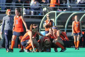 Syracuse players console a teammate after the Orange's 2-1 loss to Michigan State in the first round of the NCAA tournament.
