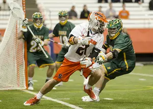 Kevin Rice tallied eight assists, Dylan Donahue scored eight goals and the Orange cruised to a season-opening win over Siena. 