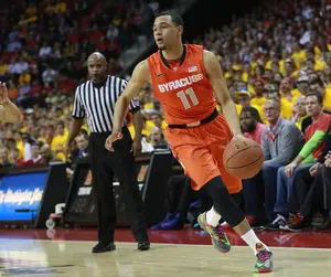 Tyler Ennis finished with 20 points on 9-of-18 shooting Monday night, guiding No. 4 Syracuse to a 57-55 win over Maryland after struggling against Duke two days prior. 