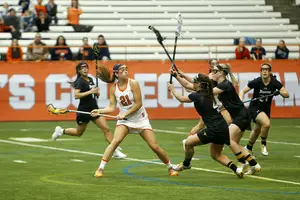 Kayla Treanor winds up for a shot in Syracuse's 12-7 win over Towson on Saturday. The sophomore scored four second-half goals to help the Orange stay undefeated. 