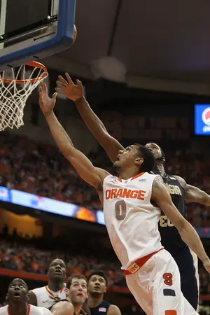 Michael Gbinije goes up for a layup in No. 7 Syracuse's 67-62 loss to Georgia Tech Tuesday. The Orange sputtered throughout the contest and got edged by the unranked Yellow Jackets. 