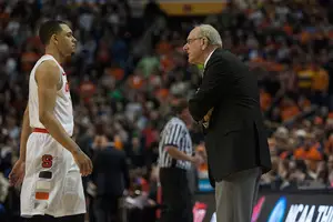 SU head coach Jim Boeheim (right) cited Syracuse's shooting woes as the team's downfall against Dayton. But as a whole, it's hard to see where SU went wrong as it sputtered down the stretch. 