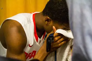 C.J. Fair weeps in the locker room after Syracuse's 55-53 loss to Dayton in the third round of the NCAA Tournament. Fair shot just 4-of-14 from the field.