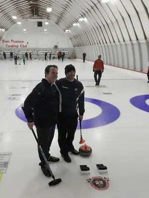 Jeff Lutz (left), a 2006 Syracuse University graduate, is helping to create the first Israeli curling team. Simon Pack (right)
is the director of development for the team. Lutz hopes to compete in the 2018 PyeongChang Winter Olympics with the team, alongside his brother, Brad. Lutz practices at his local curling club a few times a week.