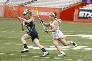 Kailah Kempney (right) is Syracuse's all-time leader in draw controls,and looks to pad her total against Duke on Saturday. 