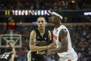 C.J. Fair defends Western Michigan's David Brown in the second half of Syracuse's 77-53 win over the Broncos on Thursday. 