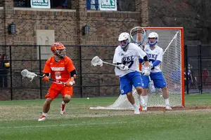 Kevin Rice tries to get a shot off against Duke. SU scored just seven goals and turned the ball over 16 times in a 21-7 loss. 