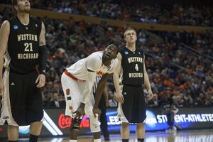 Baye Moussa Keita looks on in Syracuse's 77-53 win over Western Michigan on Thursday. The senior center, along with Rakeem Christmas, was integral to the team's strong defensive effort. 