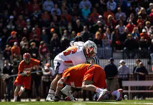 Chris Daddio gets leverage on a faceoff during Syracuse's 15-9 win over Hobart. Daddio won 5-of-6 draw in the fourth quarter as the Orange pulled away.
